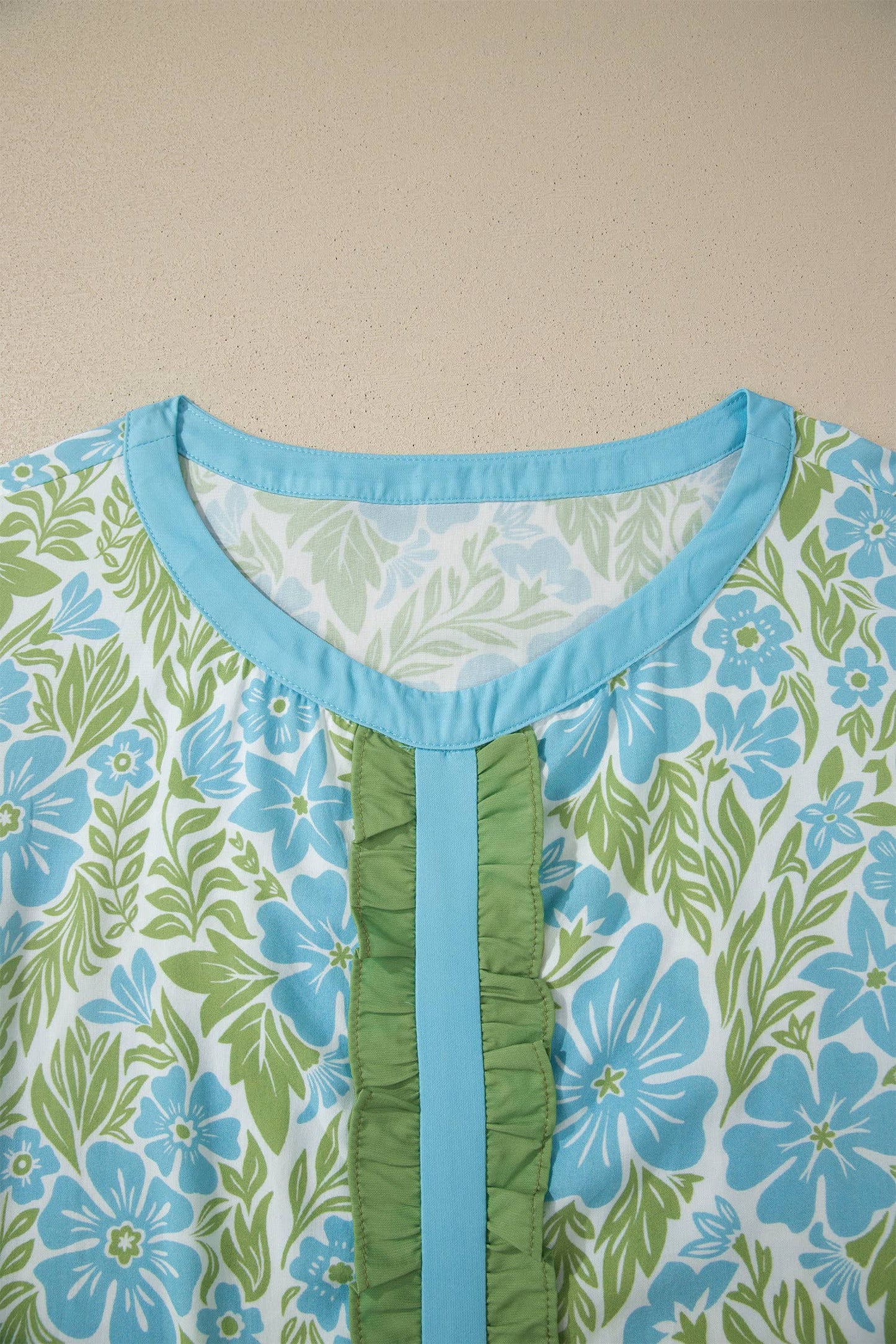 Contrast Flutter Sleeve Floral Peplum Blouse